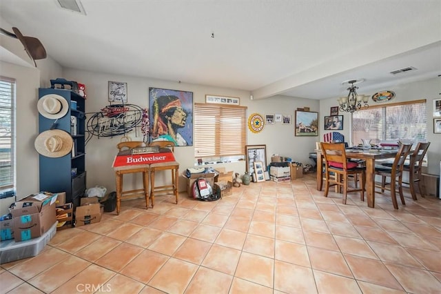 28532 Forest Meadow Pl, Castaic, CA 91384 - tiled dining area with a chandelier