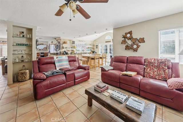 28532 Forest Meadow Pl, Castaic, CA 91384 - living area featuring a ceiling fan, lofted ceiling, and light tile patterned flooring