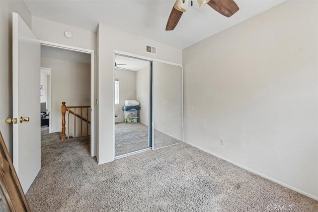 28532 Forest Meadow Pl, Castaic, CA 91384 - unfurnished bedroom with carpet flooring, a closet, a ceiling fan, and baseboards