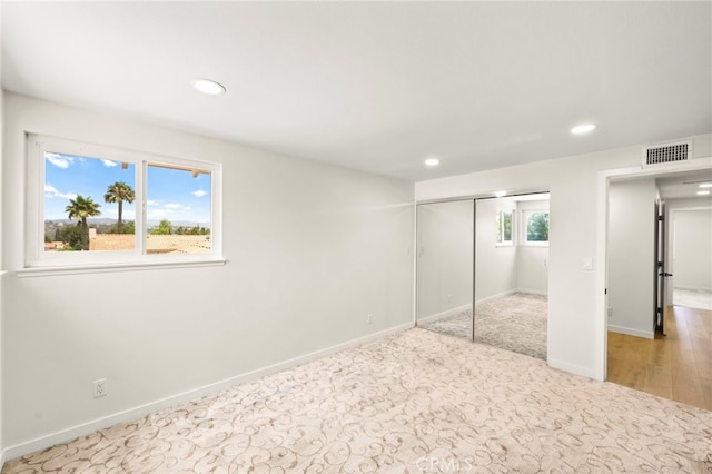 241 S Solomon Dr, Anaheim, CA 92807 - unfurnished bedroom featuring recessed lighting, baseboards, a closet, and carpet