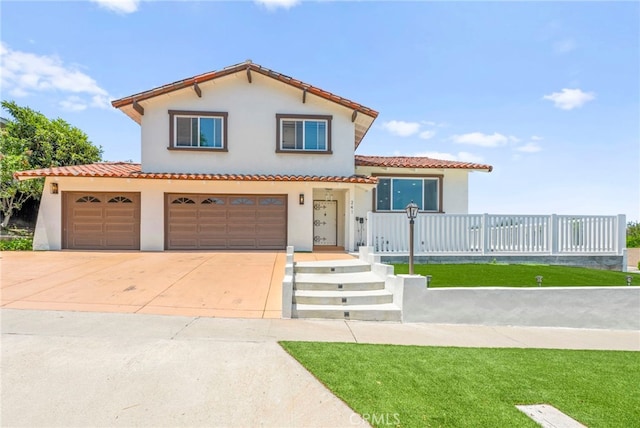 241 S Solomon Dr, Anaheim, CA 92807 - mediterranean / spanish-style house featuring stucco siding, concrete driveway, a front yard, and a tiled roof
