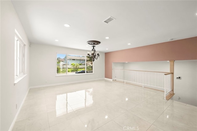 241 S Solomon Dr, Anaheim, CA 92807 - unfurnished room with recessed lighting, baseboards, and a chandelier