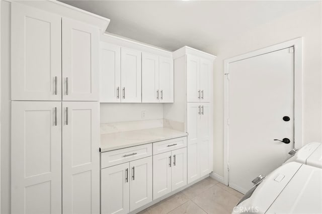 241 S Solomon Dr, Anaheim, CA 92807 - laundry room with cabinet space, washing machine and dryer, and baseboards