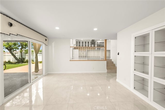 241 S Solomon Dr, Anaheim, CA 92807 - tiled empty room featuring stairway, recessed lighting, baseboards, and built in features