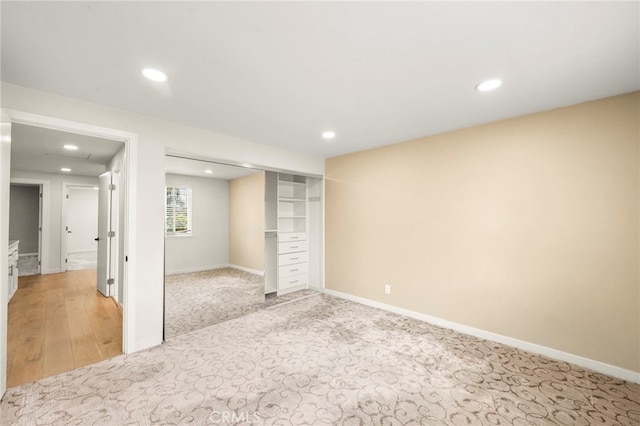 241 S Solomon Dr, Anaheim, CA 92807 - unfurnished bedroom featuring recessed lighting, baseboards, light carpet, light wood finished floors, and a closet
