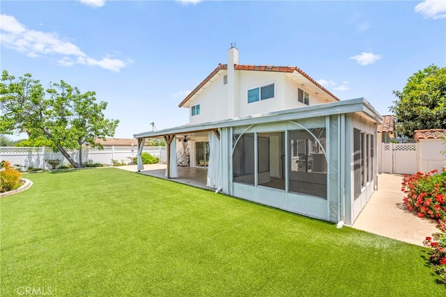 241 S Solomon Dr, Anaheim, CA 92807 - back of property with a sunroom, a patio area, and a chimney