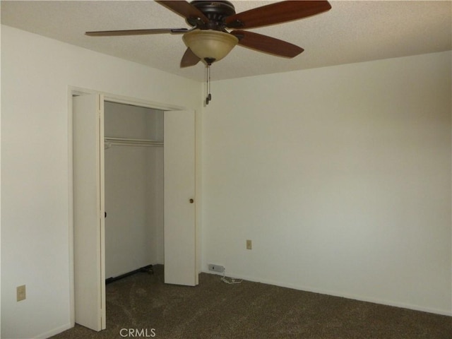 26276 Foxgrove Rd, Menifee, CA 92586 - unfurnished bedroom with dark colored carpet, a closet, and a ceiling fan