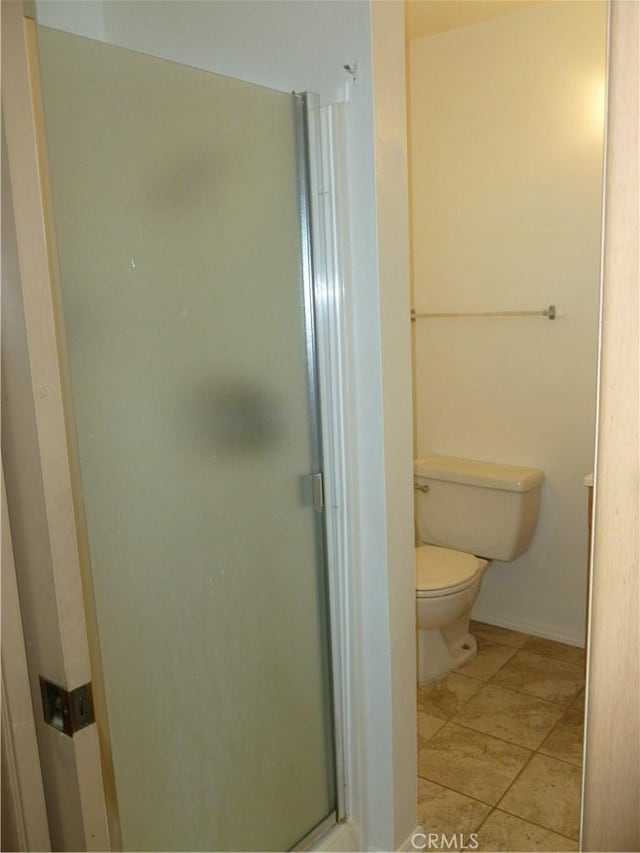 26276 Foxgrove Rd, Menifee, CA 92586 - full bath with a shower stall, toilet, and tile patterned flooring