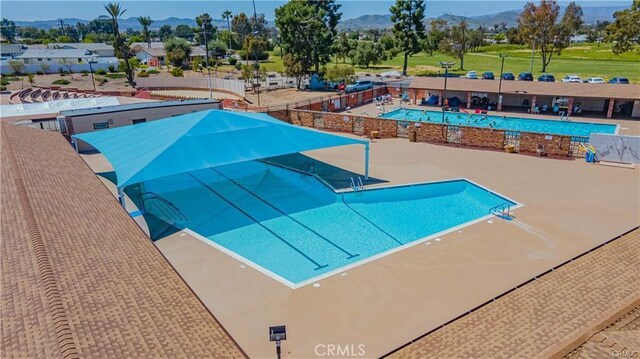 26276 Foxgrove Rd, Menifee, CA 92586 - community pool featuring a mountain view