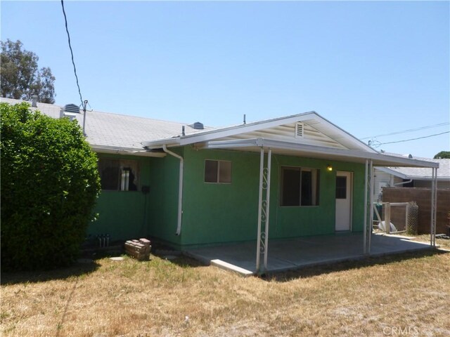 26276 Foxgrove Rd, Menifee, CA 92586 - back of house with a patio and a yard