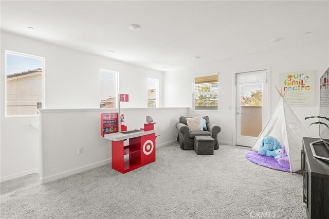 1924 N Floret Dr, Los Angeles, CA 90222 - recreation room with carpet flooring and baseboards