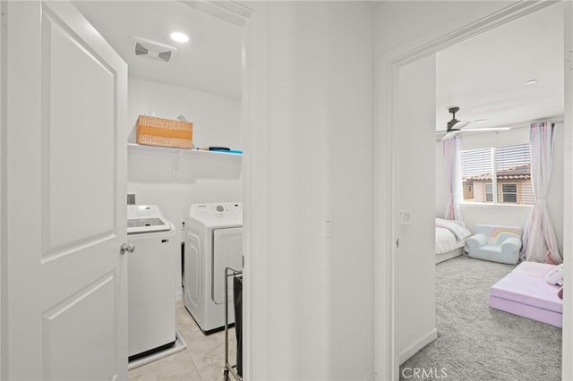 1924 N Floret Dr, Los Angeles, CA 90222 - laundry room featuring washer and clothes dryer, light carpet, and a ceiling fan