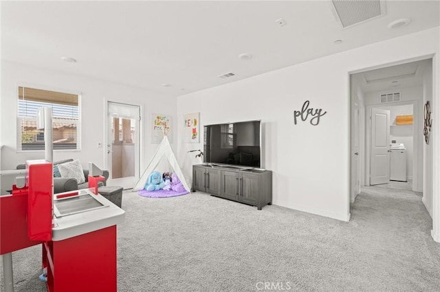 1924 N Floret Dr, Los Angeles, CA 90222 - game room with carpet floors, washer / clothes dryer, and baseboards