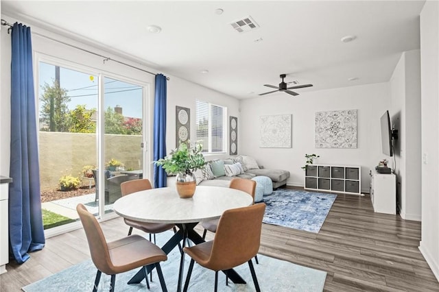 1924 N Floret Dr, Los Angeles, CA 90222 - dining room with a ceiling fan, wood finished floors, and baseboards