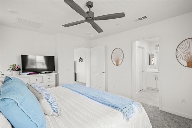 1924 N Floret Dr, Los Angeles, CA 90222 - bedroom featuring light carpet, baseboards, connected bathroom, and a ceiling fan