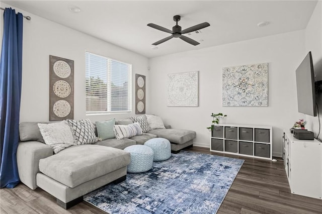 1924 N Floret Dr, Los Angeles, CA 90222 - living area with dark wood-style floors, ceiling fan, and baseboards