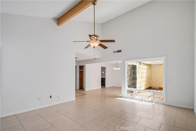 44114 30th St W, Lancaster, CA 93536 - unfurnished living room with ceiling fan, light tile patterned floors, high vaulted ceiling, beamed ceiling, and baseboards