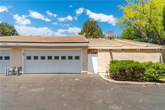 44114 30th St W, Lancaster, CA 93536 - view of front facade featuring stucco siding