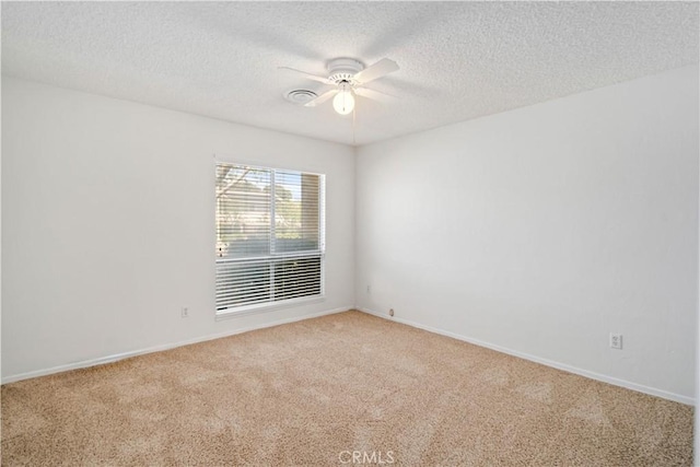 44114 30th St W, Lancaster, CA 93536 - unfurnished room with a ceiling fan, carpet flooring, a textured ceiling, and baseboards