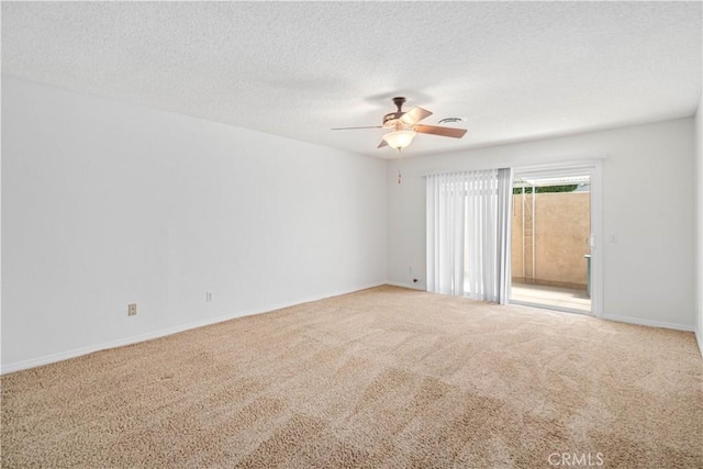 44114 30th St W, Lancaster, CA 93536 - unfurnished room featuring carpet flooring, ceiling fan, baseboards, and a textured ceiling