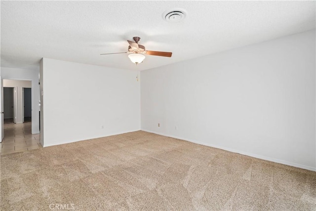 44114 30th St W, Lancaster, CA 93536 - spare room with light colored carpet, a ceiling fan, and baseboards