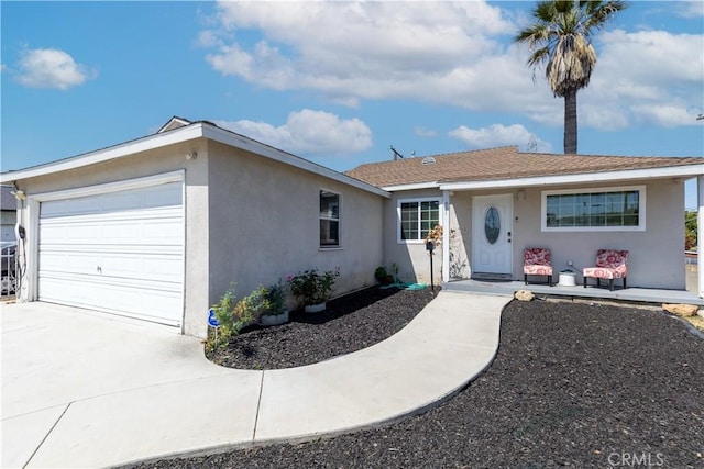 901 S Clymar Ave, Compton, CA 90220 - single story home with stucco siding, a garage, and concrete driveway