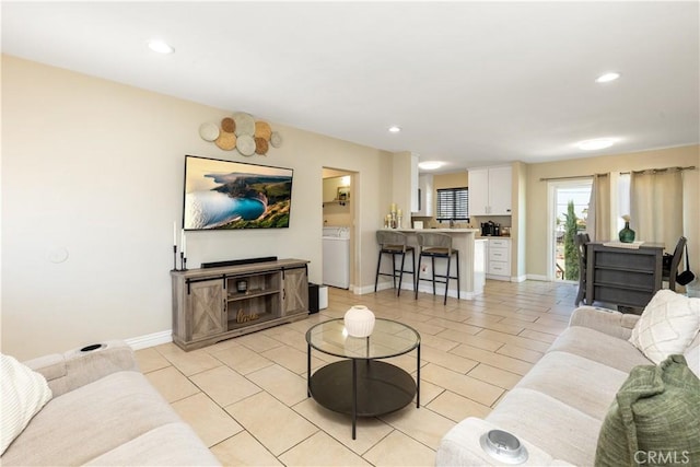 901 S Clymar Ave, Compton, CA 90220 - living area with washer / clothes dryer, baseboards, recessed lighting, and light tile patterned floors