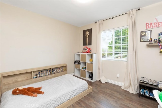 901 S Clymar Ave, Compton, CA 90220 - bedroom with wood finished floors and baseboards