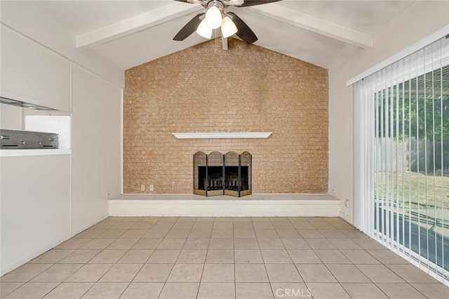 635 Brookdale Dr, Merced, CA 95340 - unfurnished living room featuring a brick fireplace, beamed ceiling, ceiling fan, light tile patterned floors, and high vaulted ceiling