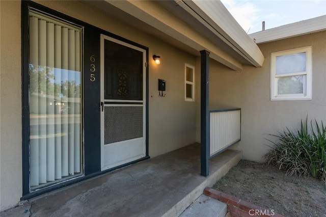 635 Brookdale Dr, Merced, CA 95340 - property entrance with stucco siding