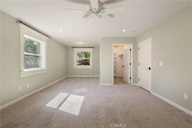 50 Walter Blume Ln, Oroville, CA 95966 - unfurnished bedroom with a spacious closet, carpet floors, baseboards, recessed lighting, and a ceiling fan