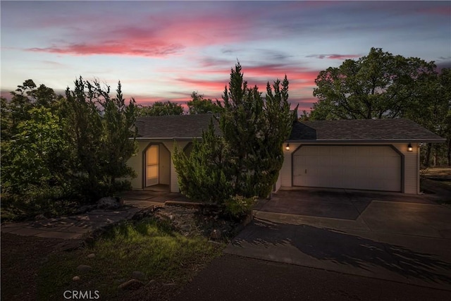 50 Walter Blume Ln, Oroville, CA 95966 - view of property hidden behind natural elements featuring a garage and concrete driveway
