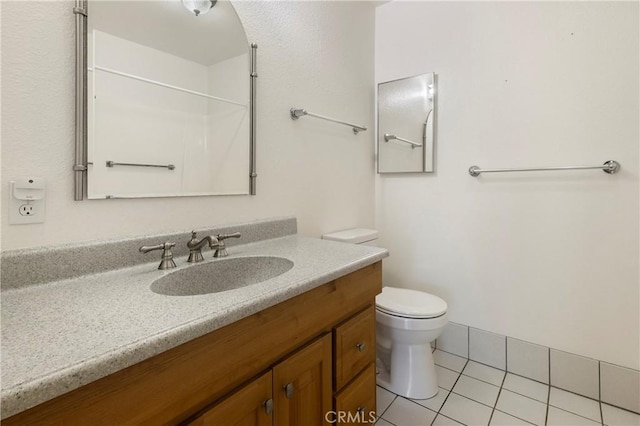 50 Walter Blume Ln, Oroville, CA 95966 - bathroom with toilet, vanity, tile patterned flooring, and a shower