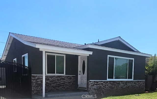16154 Calle De Paseo, Irwindale, CA 91706 - rear view of property featuring brick siding and roof with shingles