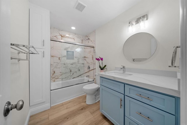 12632 Mcferon Rd, Poway, CA 92064 - bathroom with vanity, toilet, wood finished floors, combined bath / shower with glass door, and recessed lighting
