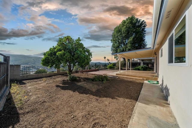 12632 Mcferon Rd, Poway, CA 92064 - fenced backyard featuring a patio and a mountain view