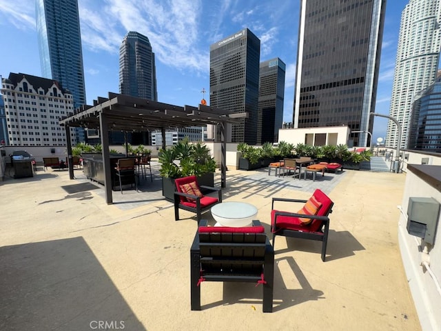 655 S Hope St Unit 903, Los Angeles, CA 90017 - view of patio featuring a view of city and a pergola