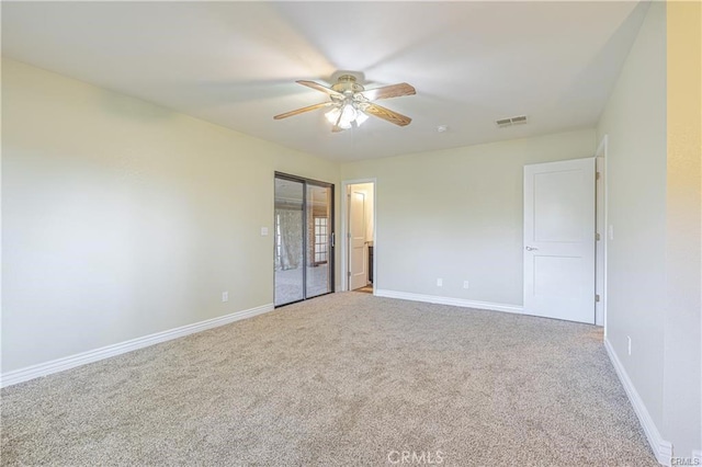 40052 18th St W, Palmdale, CA 93551 - unfurnished bedroom featuring carpet flooring, baseboards, and a ceiling fan