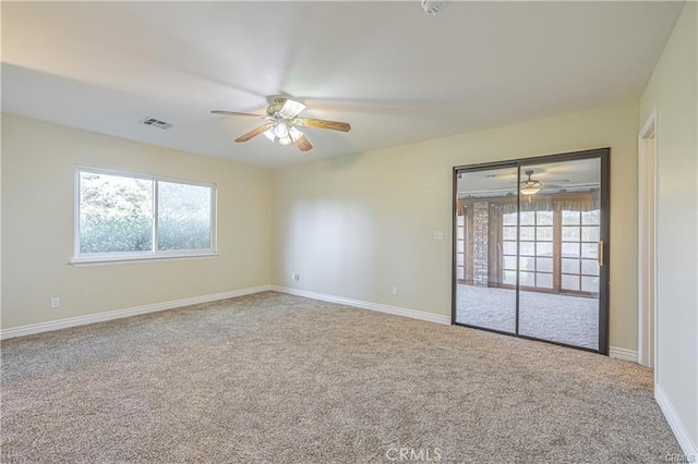 40052 18th St W, Palmdale, CA 93551 - carpeted spare room featuring a ceiling fan and baseboards