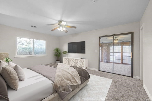 40052 18th St W, Palmdale, CA 93551 - bedroom featuring access to exterior, baseboards, light carpet, and a ceiling fan