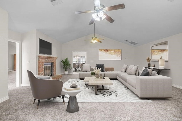 40052 18th St W, Palmdale, CA 93551 - living area with a ceiling fan, carpet, baseboards, vaulted ceiling, and a fireplace