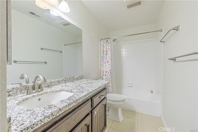 40052 18th St W, Palmdale, CA 93551 - bathroom featuring vanity, tile patterned floors, toilet, shower / bath combo with shower curtain, and baseboards