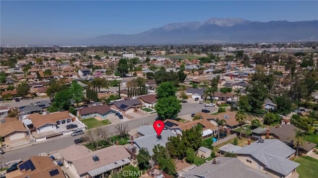 9945 Date St, Fontana, CA 92335 - aerial view of property's location with nearby suburban area and mountains