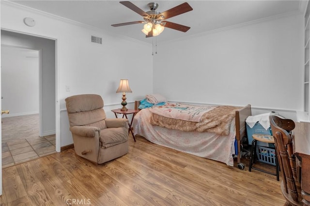 9945 Date St, Fontana, CA 92335 - bedroom with ornamental molding, wood finished floors, ceiling fan, and baseboards