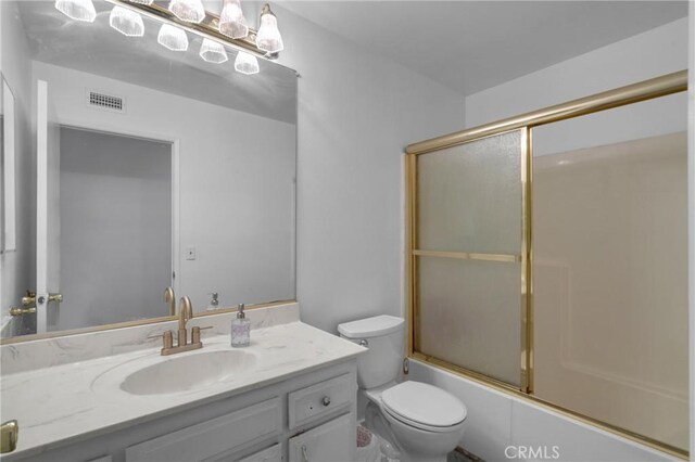 9945 Date St, Fontana, CA 92335 - bathroom with vanity, toilet, and enclosed tub / shower combo