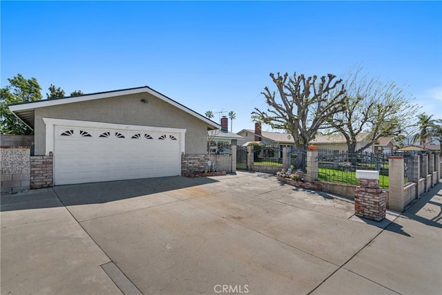 9945 Date St, Fontana, CA 92335 - ranch-style home with stucco siding, a garage, and stone siding