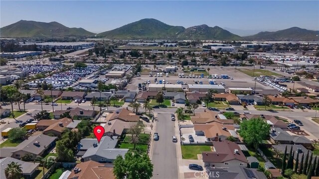 9945 Date St, Fontana, CA 92335 - aerial overview of property's location with a mountainous background