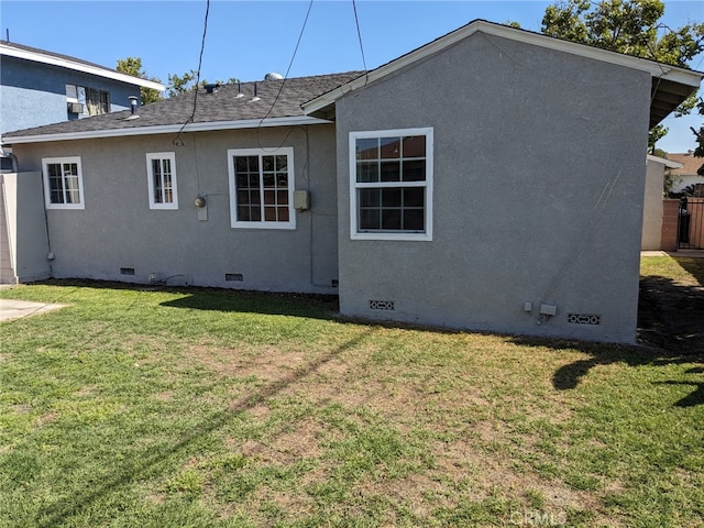 12707 Hoback St, Norwalk, CA 90650 - rear view of house with crawl space, a shingled roof, and stucco siding