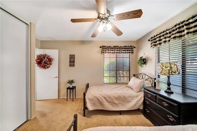 42635 56th St W, Lancaster, CA 93536 - bedroom featuring light carpet, a ceiling fan, and baseboards