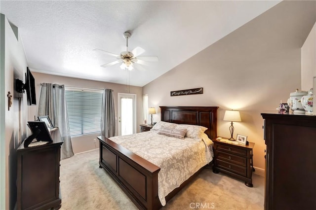 42635 56th St W, Lancaster, CA 93536 - bedroom with light carpet, baseboards, vaulted ceiling, and ceiling fan